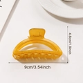 Bernsteinfarbene, halbtransparente Haarklammer aus Acryl, Größe 9 cm lang und 4,8 cm hoch - Honiggelb