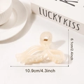Elegant cream translucent resin bow hair claw clip with minimalist streamlined design - Cream