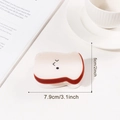 Simpatica molletta per capelli a forma di toast bianco crema con viso, misura 7,9cm - Pane Tostato Bianco