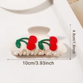 Creamy white 10cm cherry claw clip for hair with 3D red fruit accents in a matte finish - Off White