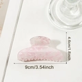 Pinza per capelli rosa traslucida con trama marmorea, dimensioni 9 cm x 4,6 cm - Rosa e Bianco