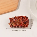 Red-brown tortoiseshell cat-shaped hair claw clip with elegant gold outlines and 8.2cm size - Caramel color