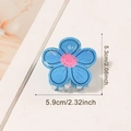 Blue floral hair claw clip with hand-painted patterns and sizing 5.9cm x 5.3cm - Blue