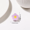 Mini purple 2cm flower hair claw clip with yellow center in resin finish - Purple Flower Style