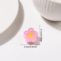 Mini 2cm pink flower hair claw clip with yellow center and translucent resin finish - Pink Flower Style