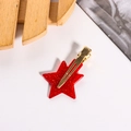 Pince à cheveux étoile rouge pailletée avec finition scintillante et clip doré en métal - Barrette Étoile Rouge Pailletée (D15-1-3)