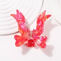 Pink marble texture hair claw clip with butterfly wing design on a white plate - L / Pearlescent Red