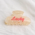 Molla per capelli in acetato marmorizzato crema con scritta Lucky rossa - Lucky Arancio Rosa