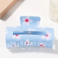 Light blue daisy rectangular hair claw clip with white floral patterns and resin finish - Translucent Blue Cat Eye Metal Decor