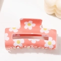 Square coral pink hair claw clip with white daisy print and polished resin finish - Orange
