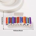 Artistic cream book-shaped hair claw clip with colorful Jane Eyre book spine designs - Off-White Base Book