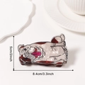 Bulldog haarclip van acetaat in crème en bruin met een lengte van circa 8,4 cm - Buldog Vorm