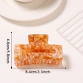 Orange marble acetate shark hair clip with iridescent glitter and 8.4cm length dimension - Orange Brown