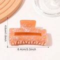 Orange marble pattern rectangular hair claw clip with pearlescent finish and dimensions - Iridescent Orange Brown