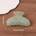 Light green scalloped hair claw clip with shell texture and 8.9cm x 5cm dimensions - Mint Green