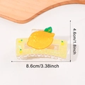 Chic yellow acetate lemon hair claw clip with lemon print and green leaf detail - Lemon