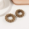 Two-piece set of brown spiral fabric elastic hair ties with silver metal accent detail - Tan