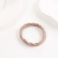 Elastic Morandi light brown hair tie with a textured woven structure on white background - Twist Style (A36-2-9)