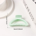 Light green semi-circular large hair claw clip in smooth resin with 9cm width dimension - Cyan