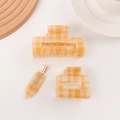 Set di tre fermagli per capelli con motivo a scacchi gialli e bianchi in stile acrilico - Arancione a Quadri Collezione