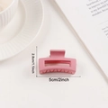 Pink matte square claw clip in small size 5cm for hair styling shown on desk - Pink (d26)