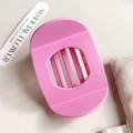 Tagliauova rosa in plastica opaca con quattro linee di taglio per la cucina - Rosa
