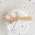 Elegante molletta a farfalla beige con strass e dettaglio gemma color champagne - Caffellatte
