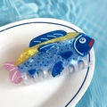 Blue and yellow tropical fish hair claw clip with colorful polka dots on a white plate - Spotted Fish