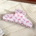 Pink acetate shark hair clip with sweet red bow pattern on white knitted background - Pink Bowknot