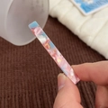 Fermaglio in acetato marmorizzato rosa e blu con glitter e base dorata - Arcobaleno Piccolo