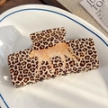 Elegant leopard print rectangular hair claw clip featuring a walking leopard motif - Yellow Leopard