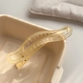 Pince à cheveux mate ambre translucide au design incurvé en résine minimaliste - Jaune mat