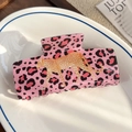 Pink leopard print hair claw clip featuring a golden leopard motif for women hair styling - Pink Leopard
