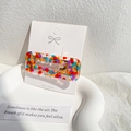 Rechteckige Acetate-Haarspange mit bunten Einlagen auf eleganter weißer Displaykarte - Roter Rechteckiger Clip (红色-方夹)