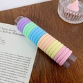 Set de gomas elásticas para el pelo color macaron en un cilindro con tonos pasteles - Estilo B-Colores Macaron