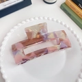 Pink and purple marbled acetate hair claw clip on a decorative white porcelain plate - Jelly Purple