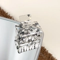 Square acrylic hair claw clip with black stone texture on a reflective surface - 5cm / Carbon Black