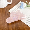Iridescent pink mermaid style large hair claw clip on dark wooden background - Pink Cloud