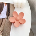 Matte pink flower hair claw clip with minimalist five-petal design on white desk - Light Orange / 7.5cm