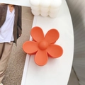 Vibrant orange flower hair claw clip with a matte finish for elegant hairstyling - Orange / 7.5cm