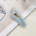 Waterdrop acetate hair clip featuring light blue and white marble texture with gold metal grip - Teardrop Royal Blue Marble