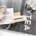 Elegant cream pearl acetate hair claw clip with a minimalist hollow rectangle design - 7.5cm / AB White