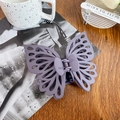 Pince à cheveux papillon violet mat avec un design élégant à ailes creuses doubles - 14cm / Violet