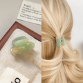 Small acetate hair claw clip with green marble texture shown in hand and worn on hair - Butterfly Design / 3cm / Apple Green