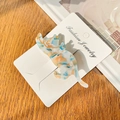 Kattenhaarclip van acetaat met blauw en oranje marmerpatroon op displaykaart - Kattenvorm / Geelgroen / 8cm