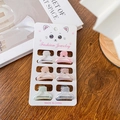 Lot de 6 mini pinces à cheveux aux couleurs bonbon nacrées sur une carte de présentation - Modèle F (Incurvé) 2.5CM