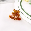 Amber acetate bear hair claw clip with heart cutout design for elegant hairstyles - Caramel color