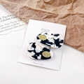 Set of two marble acetate teardrop hair clips with gold oval metal accent on white card - 4cm / Cow Pattern