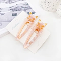 Pink marble pattern cat hair clips set with golden accents on a white display card - Phantom Pink
