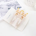 Pair of cat-shaped pearlescent white acetate hair clips with gold kitten details - AB White